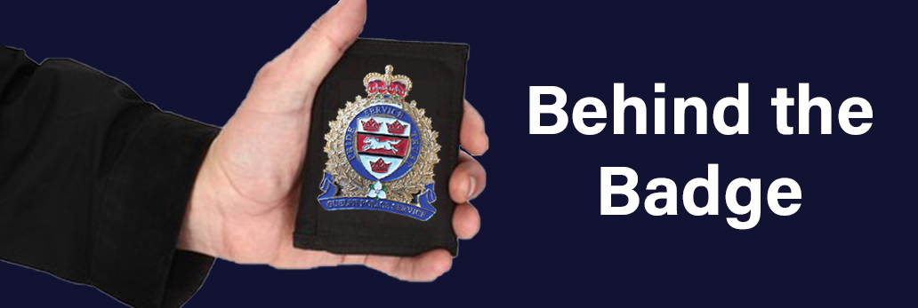 Person holding Guelph Police Badge