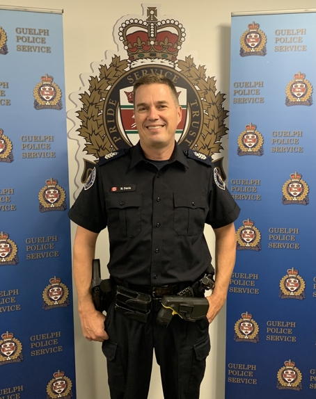 Guelph police crest, with text pride, service and trust